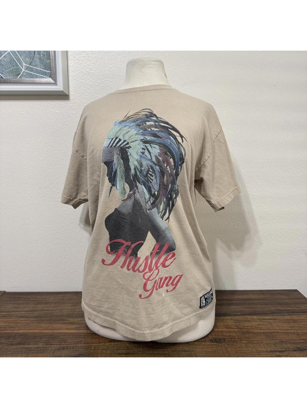 Hustle Gang Graphic T-Shirt Beige with Feathered Headdress Print Size Medium